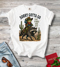 Sorry Gotta Go T-Shirt — Western Raccoon Cowboy Graphic Tee